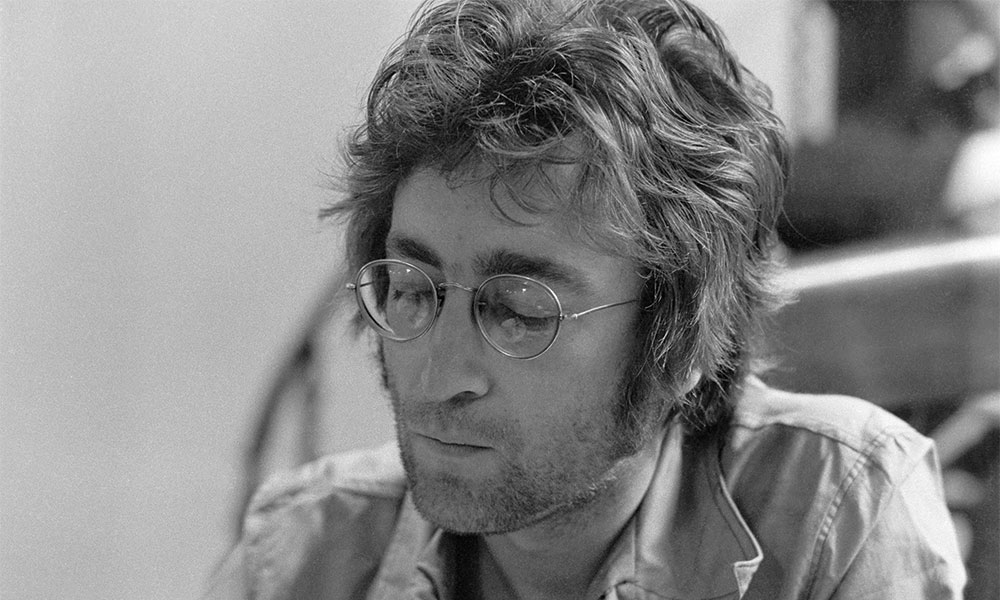 John Lennon : Woman 7 Vinyl - Reggae Land Muzik Store