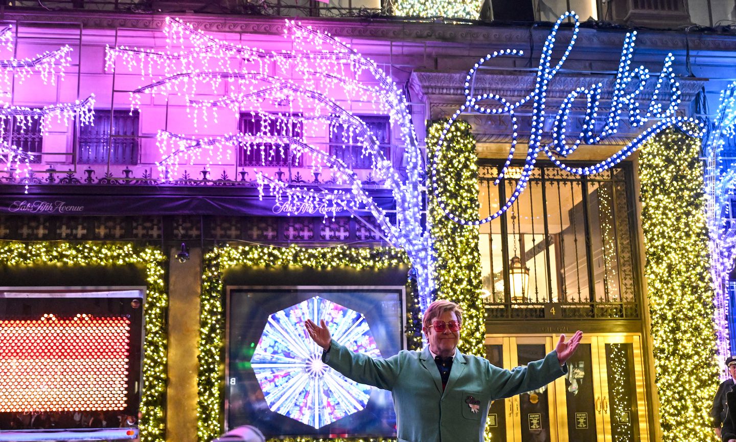 Elton John Performs at Saks Holiday Window Unveiling